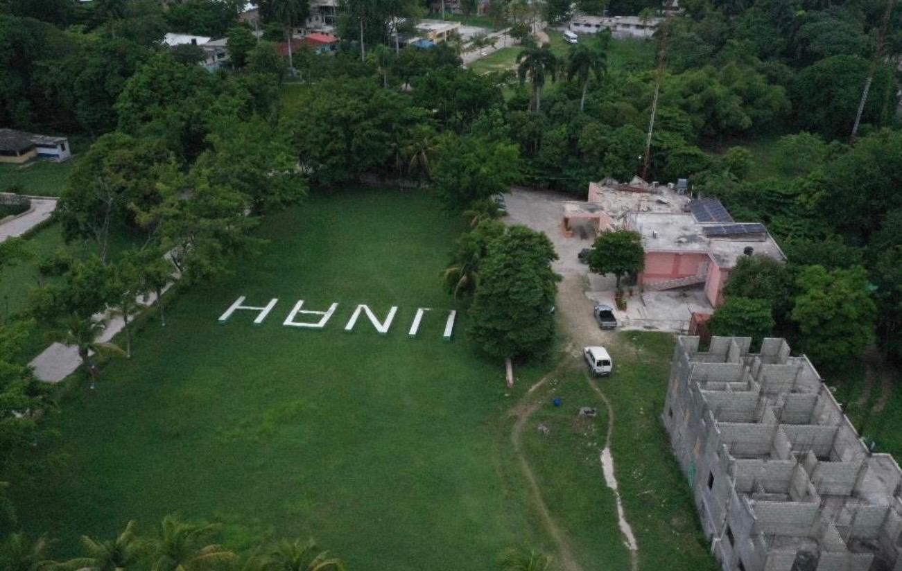 UNAH Campus Skyview, UNAH written on grass