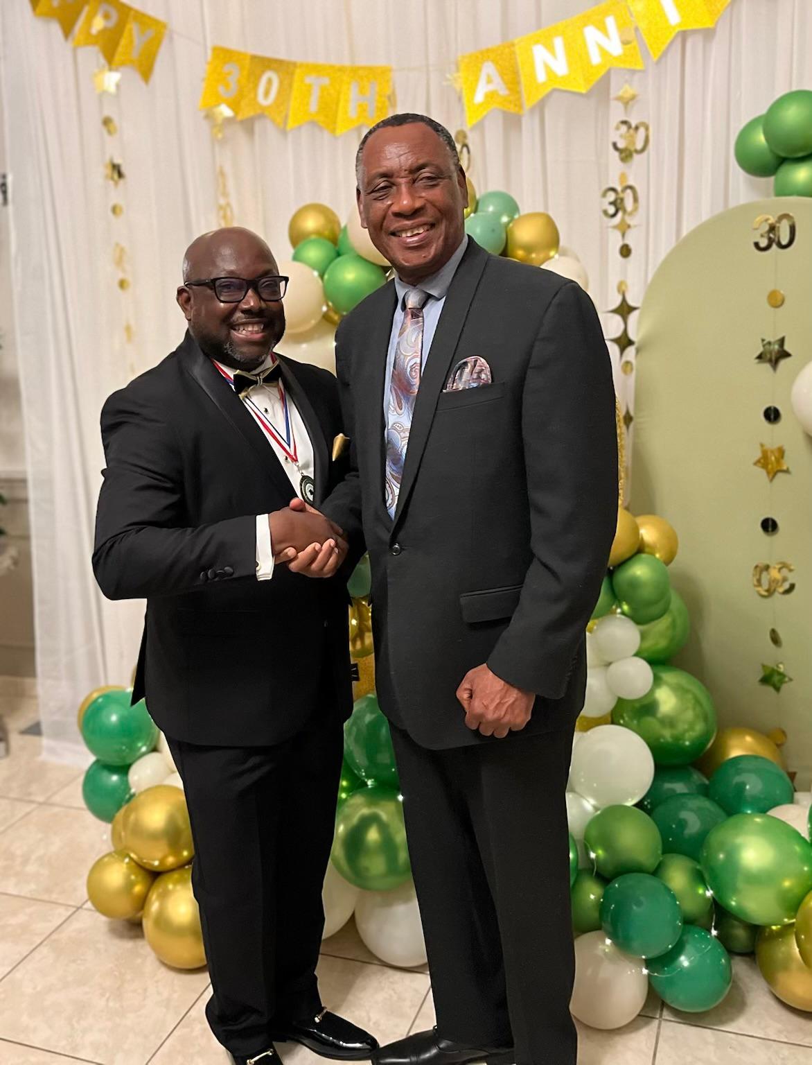 Mackensdy Dormeus with Dr. Japhe Roberne Saint Louis at CALUNAH's 30th Anniversary